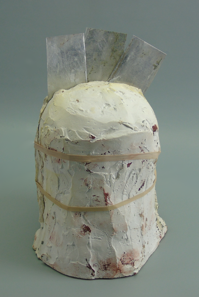 Plaster mold with shims protruding